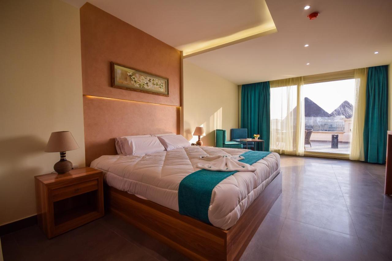 New Pyramid Quen Hotel Kairo Bagian luar foto